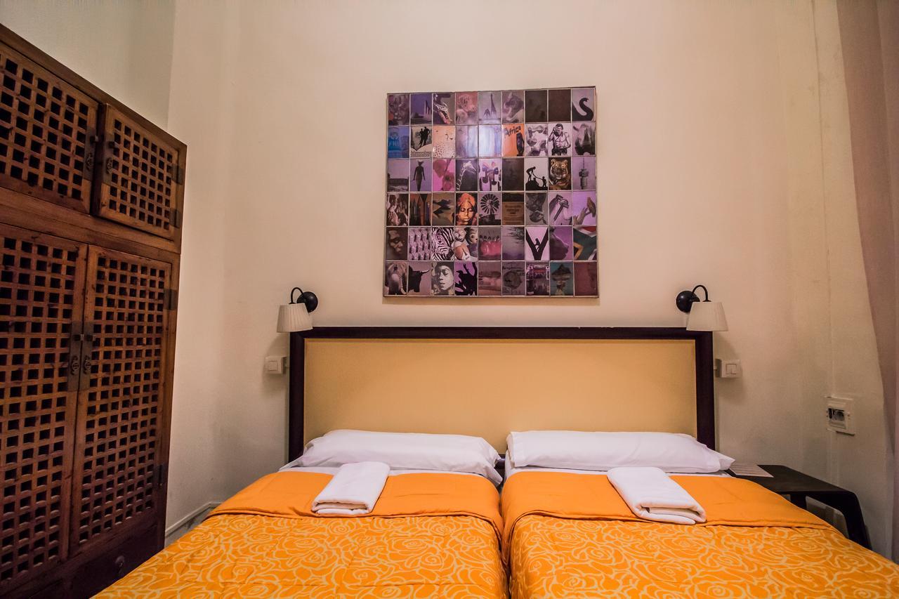 Tweepersoonskamer met 1 of 2 Bedden en Gedeelde Badkamer